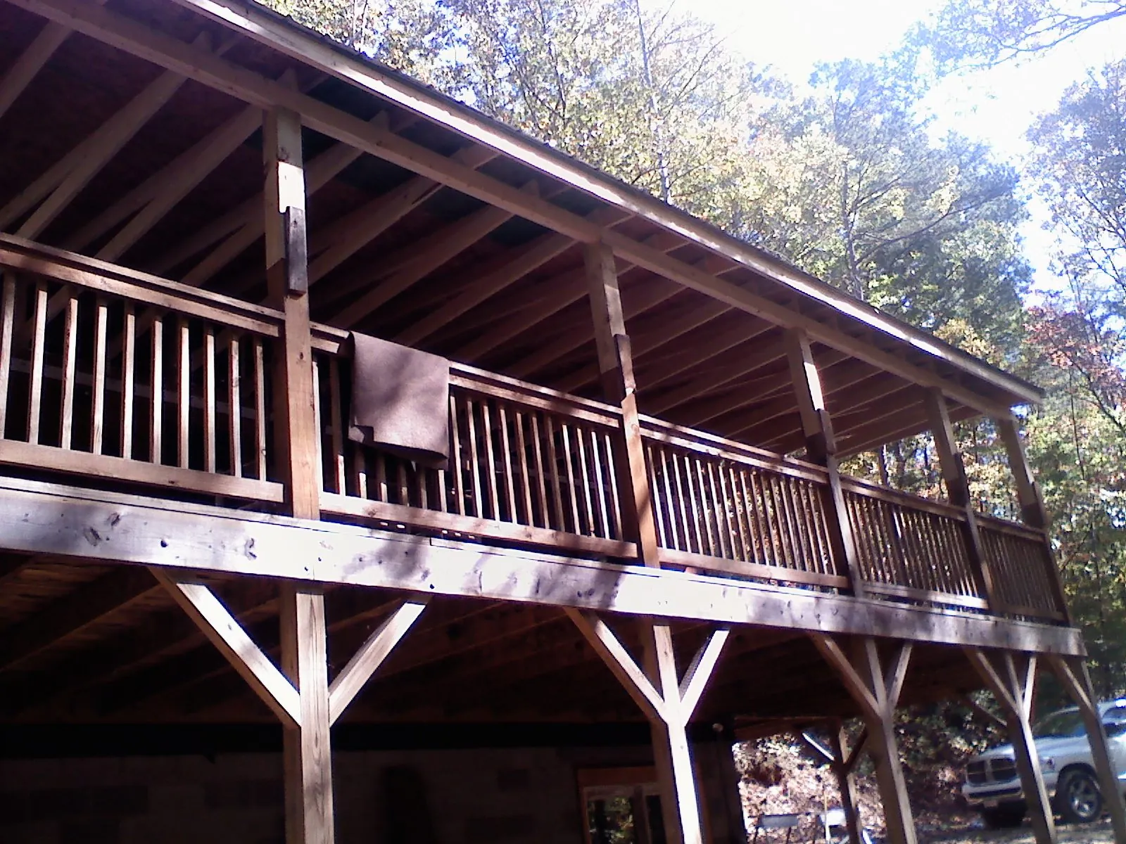 Timber framing under a new elevated porch and deck — Roof Leak Repair in Austell by Roofing Brothers